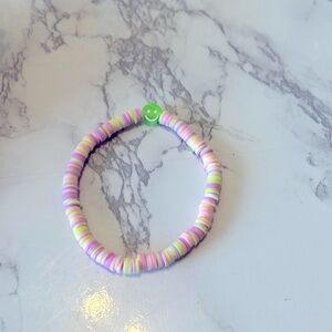 Women’s smiley face clay bead bracelet